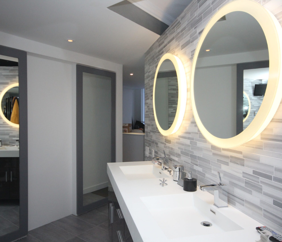 Bathroom mirrors with layered lighting for a bright, spacious feel — BK Los Angeles project photo